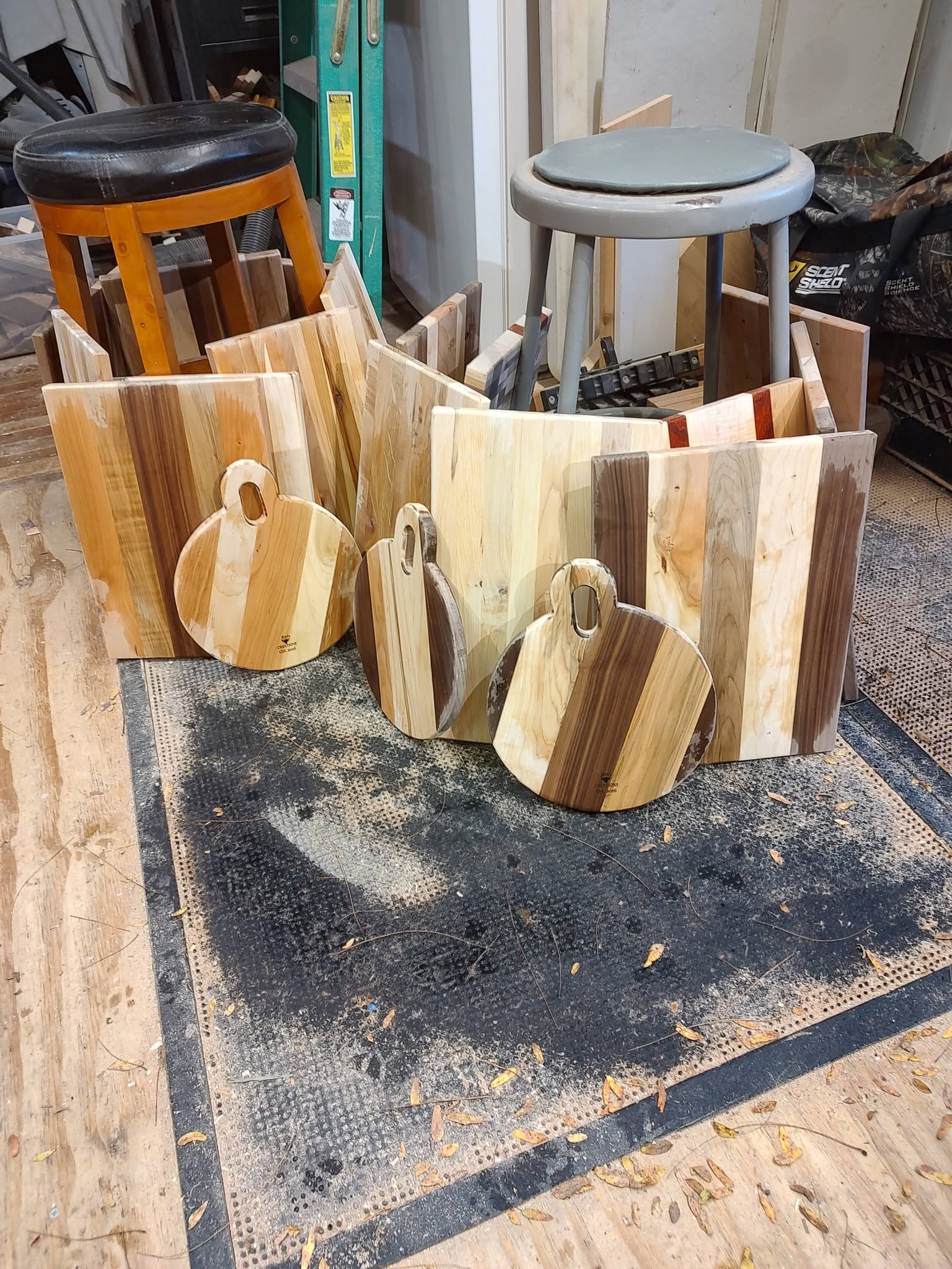 Rectangular and round handled hardwood boards arranged in the woodworking shop